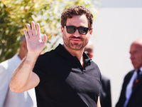 Edgar Ramirez arrives at the photocall of Emilia Perez during the 77th Festival de Cannes in Cannes, France, on May 19, 2024 (