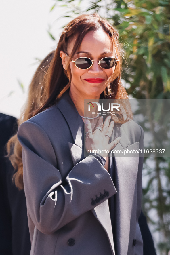 Zoe Saldana arrives at the photocall of Emilia Perez in Cannes, France, on May 19, 2024, during the 77th Festival de Cannes 