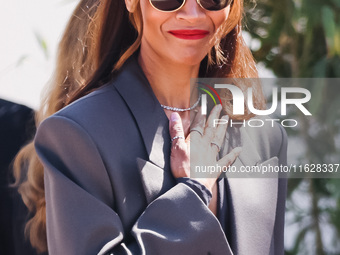 Zoe Saldana arrives at the photocall of Emilia Perez in Cannes, France, on May 19, 2024, during the 77th Festival de Cannes (