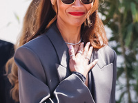 Zoe Saldana arrives at the photocall of Emilia Perez in Cannes, France, on May 19, 2024, during the 77th Festival de Cannes (