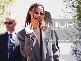 Zoe Saldana arrives at the photocall of Emilia Perez in Cannes, France, on May 19, 2024, during the 77th Festival de Cannes (