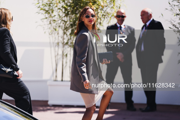 Zoe Saldana arrives at the photocall of Emilia Perez in Cannes, France, on May 19, 2024, during the 77th Festival de Cannes 