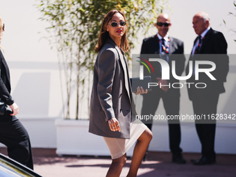 Zoe Saldana arrives at the photocall of Emilia Perez in Cannes, France, on May 19, 2024, during the 77th Festival de Cannes (