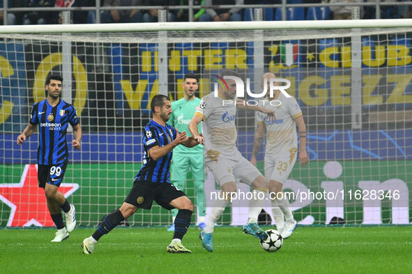 Hakan Calhanoglu of F.C. Inter is in action during the UEFA Champions League 2024/25 League Phase MD2 match between F.C. Inter and F.K. Crve...