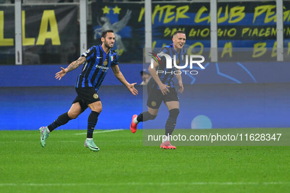 Hakan Calhanoglu of F.C. Inter celebrates after scoring the goal of 1-0 during the UEFA Champions League 2024/25 League Phase MD2 match betw...