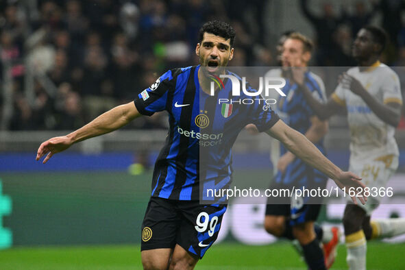 Mehdi Taremi of F.C. Inter celebrates after scoring the fourth goal during the UEFA Champions League 2024/25 League Phase MD2 match between...