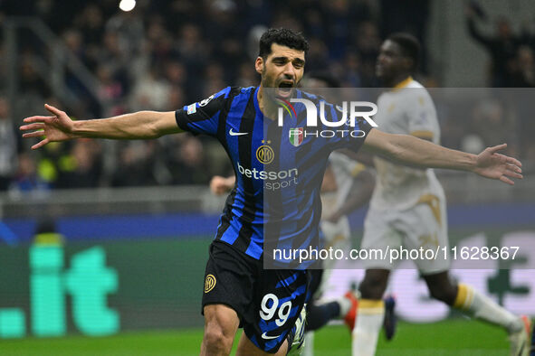 Mehdi Taremi of F.C. Inter celebrates after scoring the fourth goal during the UEFA Champions League 2024/25 League Phase MD2 match between...