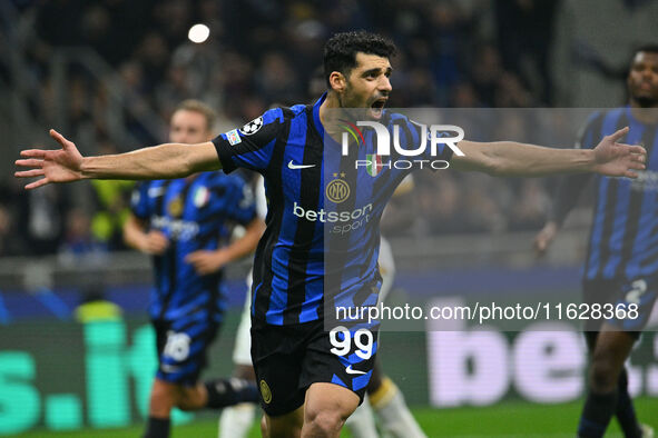 Mehdi Taremi of F.C. Inter celebrates after scoring the fourth goal during the UEFA Champions League 2024/25 League Phase MD2 match between...