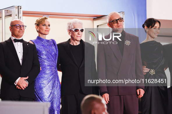 Diane Kruger, Vincent Cassel, and David Cronenberg attend the red carpet for the premiere of The Shrouds during the 77th Festival de Cannes...