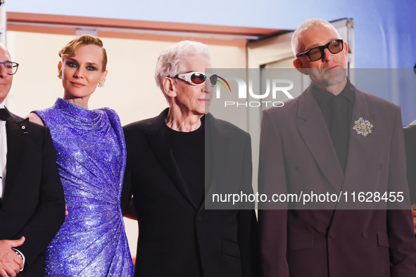 Diane Kruger, Vincent Cassel, and David Cronenberg attend the red carpet for the premiere of The Shrouds during the 77th Festival de Cannes...