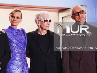 Diane Kruger, Vincent Cassel, and David Cronenberg attend the red carpet for the premiere of The Shrouds during the 77th Festival de Cannes...