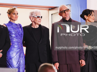 Diane Kruger, Vincent Cassel, and David Cronenberg attend the red carpet for the premiere of The Shrouds during the 77th Festival de Cannes...