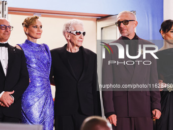 Diane Kruger, Vincent Cassel, and David Cronenberg attend the red carpet for the premiere of The Shrouds during the 77th Festival de Cannes...