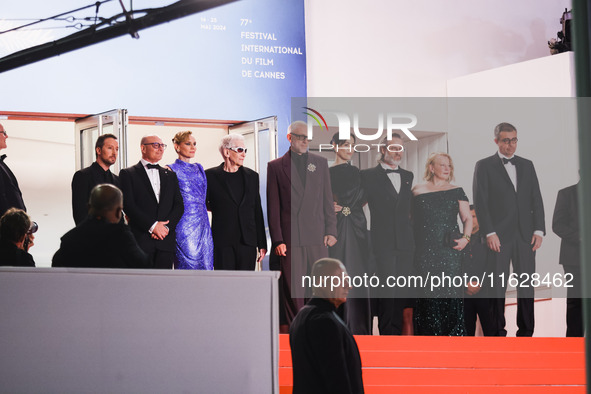 Diane Kruger, Vincent Cassel, and David Cronenberg attend the red carpet for the premiere of The Shrouds during the 77th Festival de Cannes...