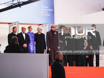 Diane Kruger, Vincent Cassel, and David Cronenberg attend the red carpet for the premiere of The Shrouds during the 77th Festival de Cannes...