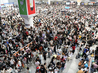 A large number of passengers wait in the waiting room of Nanchang Railway Station in Nanchang, China, on October 1, 2024. (