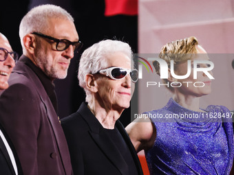 Diane Kruger, Vincent Cassel, and David Cronenberg attend the red carpet for the premiere of The Shrouds during the 77th Festival de Cannes...