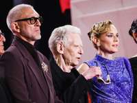 Diane Kruger, Vincent Cassel, and David Cronenberg attend the red carpet for the premiere of The Shrouds during the 77th Festival de Cannes...