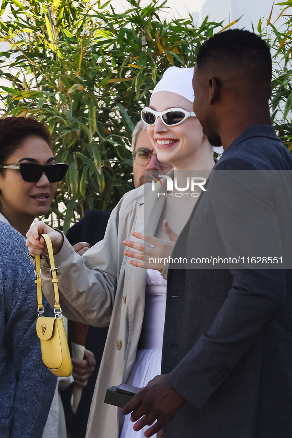 Hunter Schafer arrives at the photocall of Kinds of Kindness during the 77th Festival de Cannes in Cannes, France, on May 18, 2024 