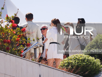 Emma Stone arrives at the photocall of Kinds of Kindness during the 77th Festival de Cannes in Cannes, France, on May 18, 2024 (