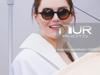 Emma Stone arrives at the photocall of Kinds of Kindness during the 77th Festival de Cannes in Cannes, France, on May 18, 2024 (