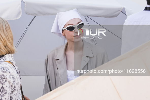 Hunter Schafer arrives at the photocall of Kinds of Kindness during the 77th Festival de Cannes in Cannes, France, on May 18, 2024 