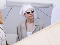 Hunter Schafer arrives at the photocall of Kinds of Kindness during the 77th Festival de Cannes in Cannes, France, on May 18, 2024 (