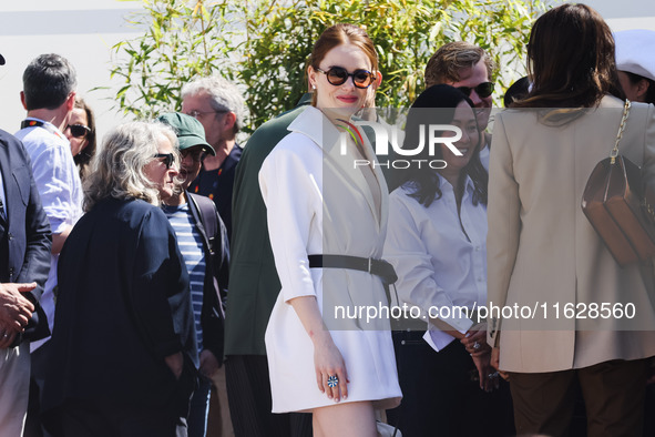 Emma Stone arrives at the photocall of Kinds of Kindness during the 77th Festival de Cannes in Cannes, France, on May 18, 2024 