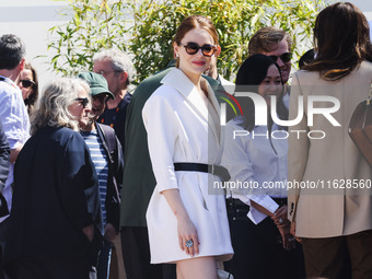 Emma Stone arrives at the photocall of Kinds of Kindness during the 77th Festival de Cannes in Cannes, France, on May 18, 2024 (