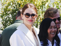 Emma Stone arrives at the photocall of Kinds of Kindness during the 77th Festival de Cannes in Cannes, France, on May 18, 2024 (