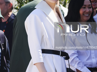 Emma Stone arrives at the photocall of Kinds of Kindness during the 77th Festival de Cannes in Cannes, France, on May 18, 2024 (