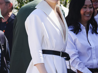 Emma Stone arrives at the photocall of Kinds of Kindness during the 77th Festival de Cannes in Cannes, France, on May 18, 2024 (