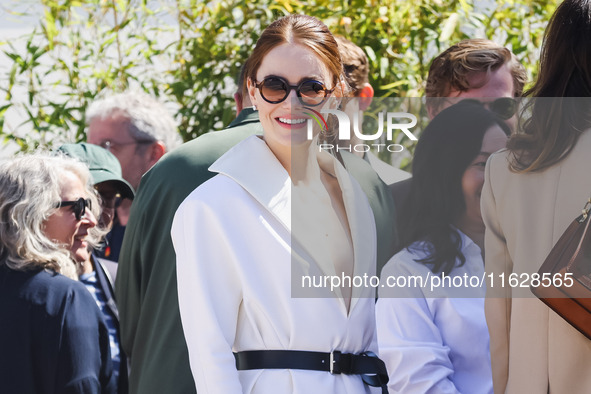 Emma Stone arrives at the photocall of Kinds of Kindness during the 77th Festival de Cannes in Cannes, France, on May 18, 2024 