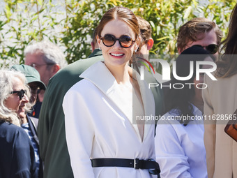 Emma Stone arrives at the photocall of Kinds of Kindness during the 77th Festival de Cannes in Cannes, France, on May 18, 2024 (