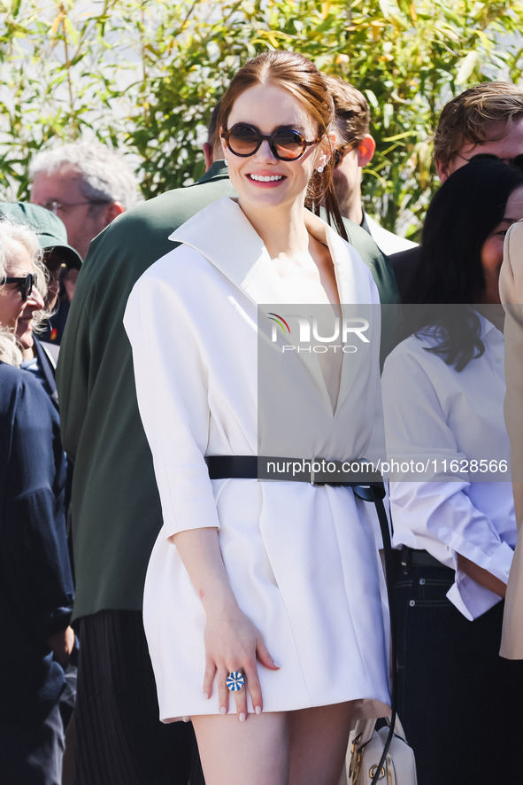 Emma Stone arrives at the photocall of Kinds of Kindness during the 77th Festival de Cannes in Cannes, France, on May 18, 2024 