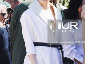 Emma Stone arrives at the photocall of Kinds of Kindness during the 77th Festival de Cannes in Cannes, France, on May 18, 2024 (