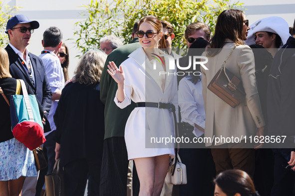 Emma Stone arrives at the photocall of Kinds of Kindness during the 77th Festival de Cannes in Cannes, France, on May 18, 2024 