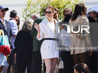 Emma Stone arrives at the photocall of Kinds of Kindness during the 77th Festival de Cannes in Cannes, France, on May 18, 2024 (