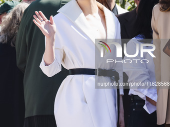 Emma Stone arrives at the photocall of Kinds of Kindness during the 77th Festival de Cannes in Cannes, France, on May 18, 2024 (