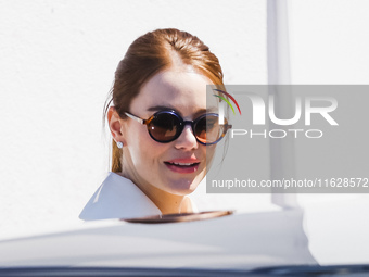 Emma Stone arrives at the photocall of Kinds of Kindness during the 77th Festival de Cannes in Cannes, France, on May 18, 2024 (