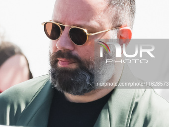 Yorgos Lanthimos arrives at the photocall of Kinds of Kindness during the 77th Festival de Cannes in Cannes, France, on May 18, 2024 (