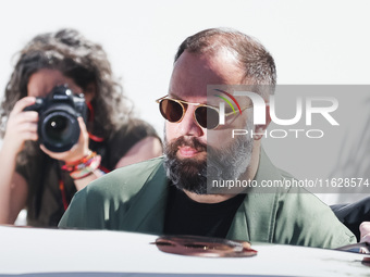 Yorgos Lanthimos arrives at the photocall of Kinds of Kindness during the 77th Festival de Cannes in Cannes, France, on May 18, 2024 (