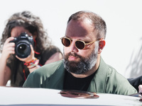 Yorgos Lanthimos arrives at the photocall of Kinds of Kindness during the 77th Festival de Cannes in Cannes, France, on May 18, 2024 (