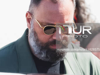 Yorgos Lanthimos arrives at the photocall of Kinds of Kindness during the 77th Festival de Cannes in Cannes, France, on May 18, 2024 (