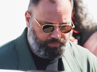 Yorgos Lanthimos arrives at the photocall of Kinds of Kindness during the 77th Festival de Cannes in Cannes, France, on May 18, 2024 (