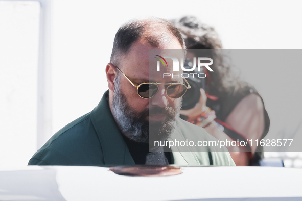 Yorgos Lanthimos arrives at the photocall of Kinds of Kindness during the 77th Festival de Cannes in Cannes, France, on May 18, 2024 