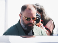 Yorgos Lanthimos arrives at the photocall of Kinds of Kindness during the 77th Festival de Cannes in Cannes, France, on May 18, 2024 (