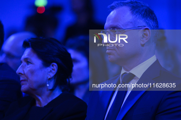 Poland's President Andrzej Duda (R) and Georgia's President Salome Zourabichvili (L) take part in the Warsaw Security Forum 2024 in Warsaw,...