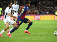 Lamine Yamal and Jaouen Hadjam play during the match between FC Barcelona and BSC Young Boys in the week 2 of the League Stage of the UEFA C...