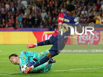 Lamine Yamal and Marvin Keller play during the match between FC Barcelona and BSC Young Boys in the week 2 of the League Stage of the UEFA C...